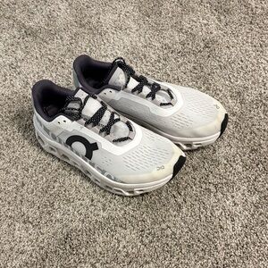 On Running Women’s White and Black Sneakers